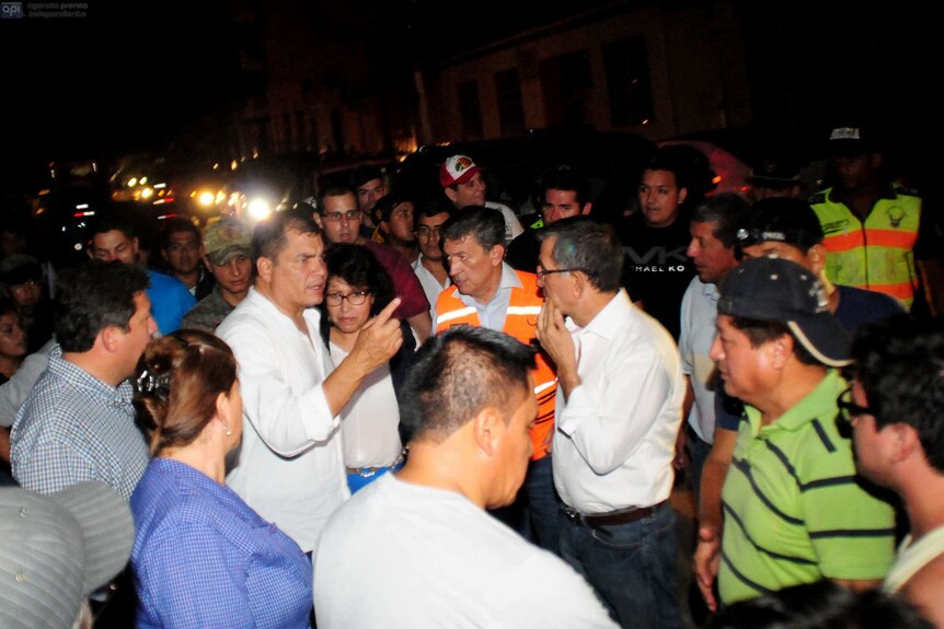Ecuador's President talking to people after a powerful earthquake.