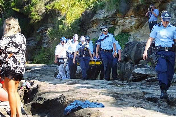 Police retrieve the body of a man from Gordon's Bay