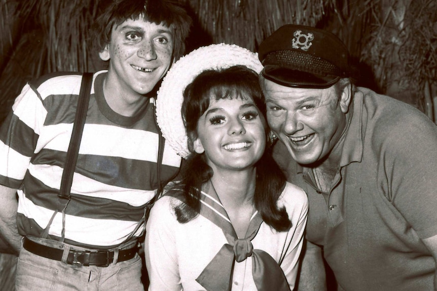 Dawn Wells, centre, poses with fellow cast members of Gilligan's Island, Bob Denver and Alan Hale Jr