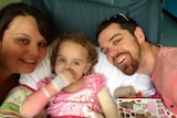 Jazmyn recovering with her mum Sarah and dad Aaron