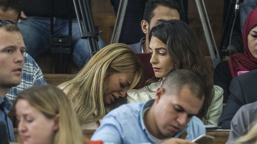 Marwa Fahmy and Amal Clooney at the trial