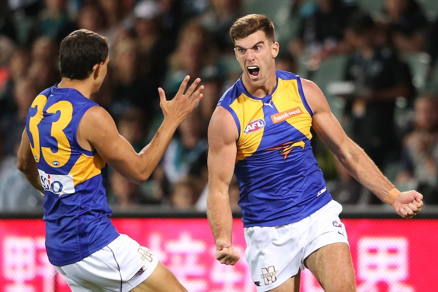 Scott Lycett celebrates a goal for West Coast