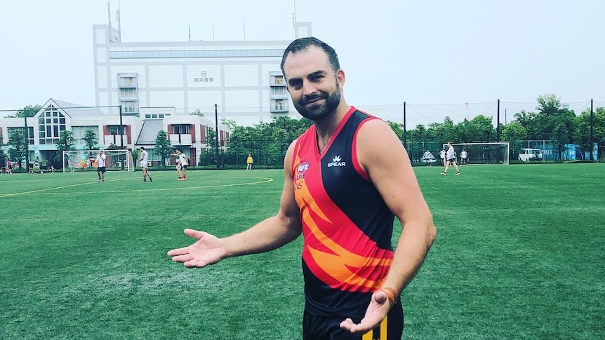 Brian Lake takes to the football field in Osaka for the Indonesian Volcanoes.