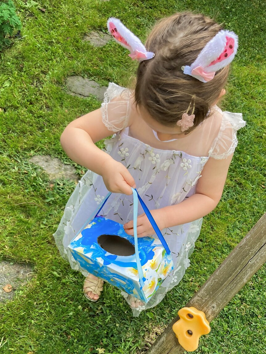 Graces daughter on easter egg hunt