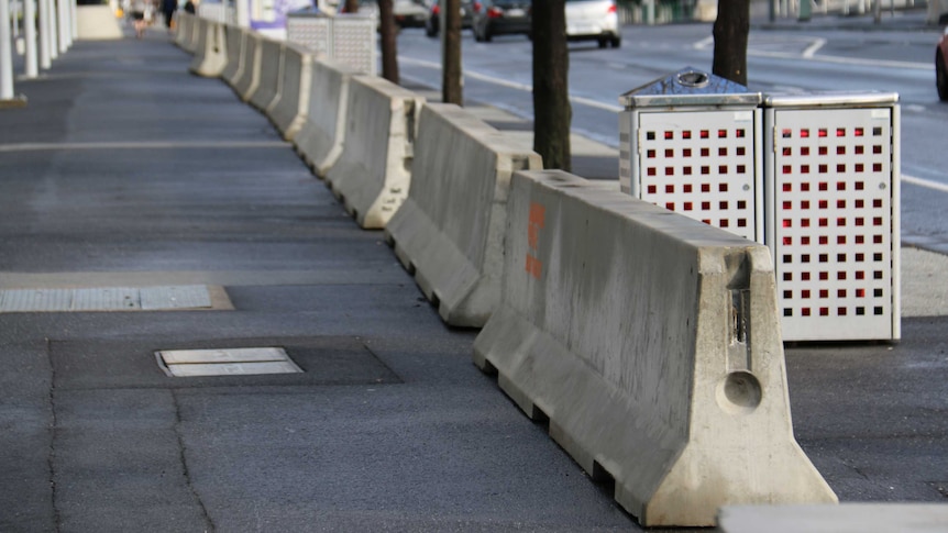 A row of new concrete barriers outside AAMI Park in Melbourne.