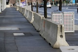 A row of new concrete barriers outside AAMI Park in Melbourne.