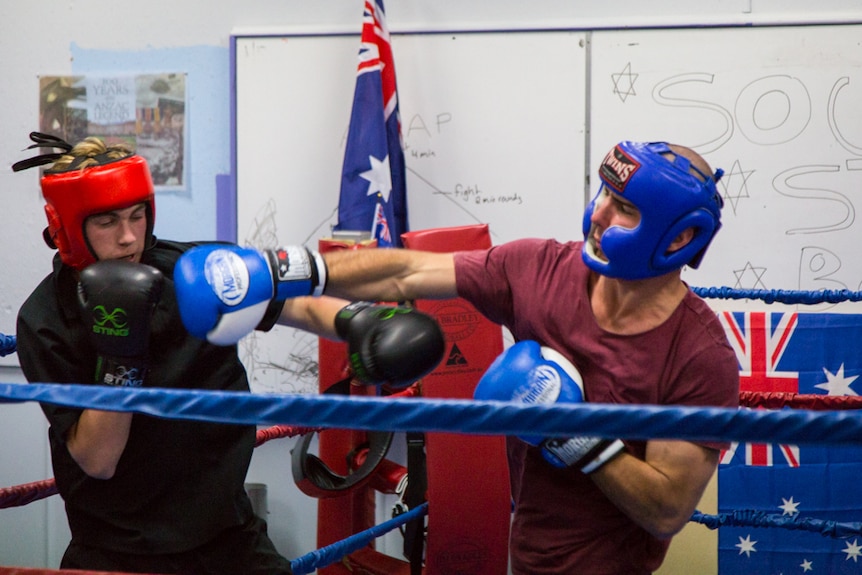 Willis Short (left) and Jordan Bikolkoski (right) practice together as upcoming Tasmanian boxers.