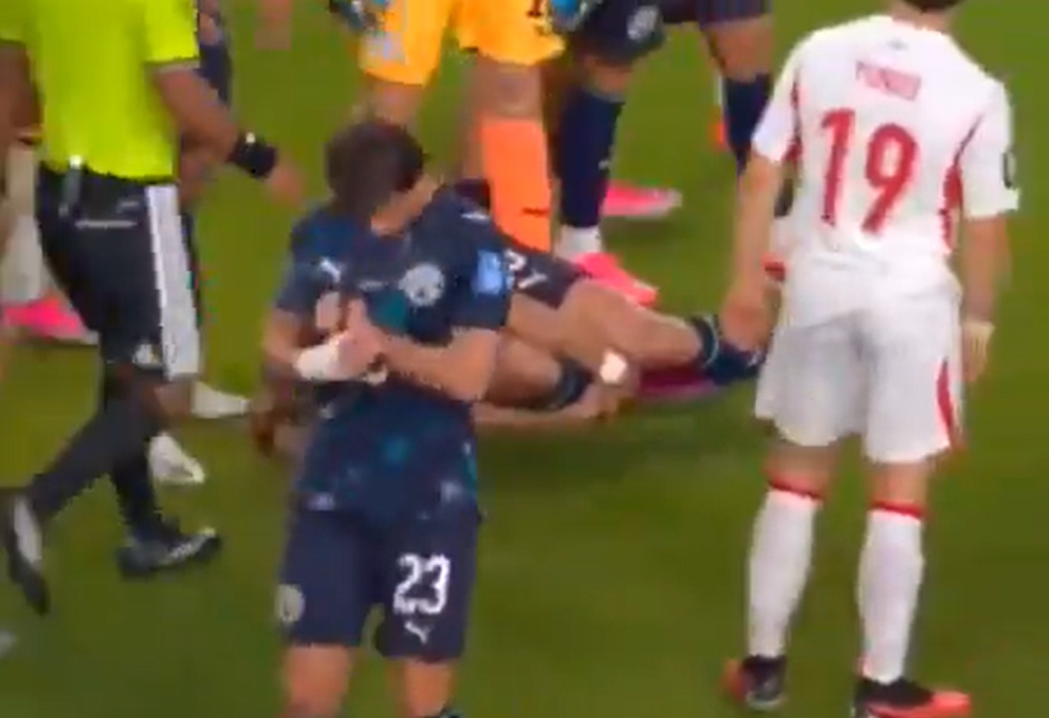 Paraguay's Matias Galarza puts on the referee's watch during a game.