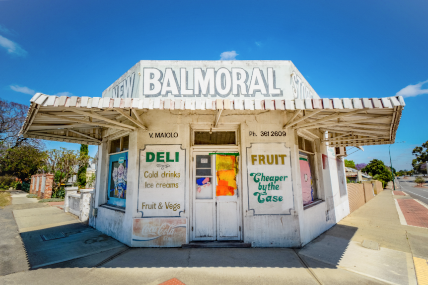 A closed deli and fruit vendor on a neighbourhood street corner in East Victoria Park