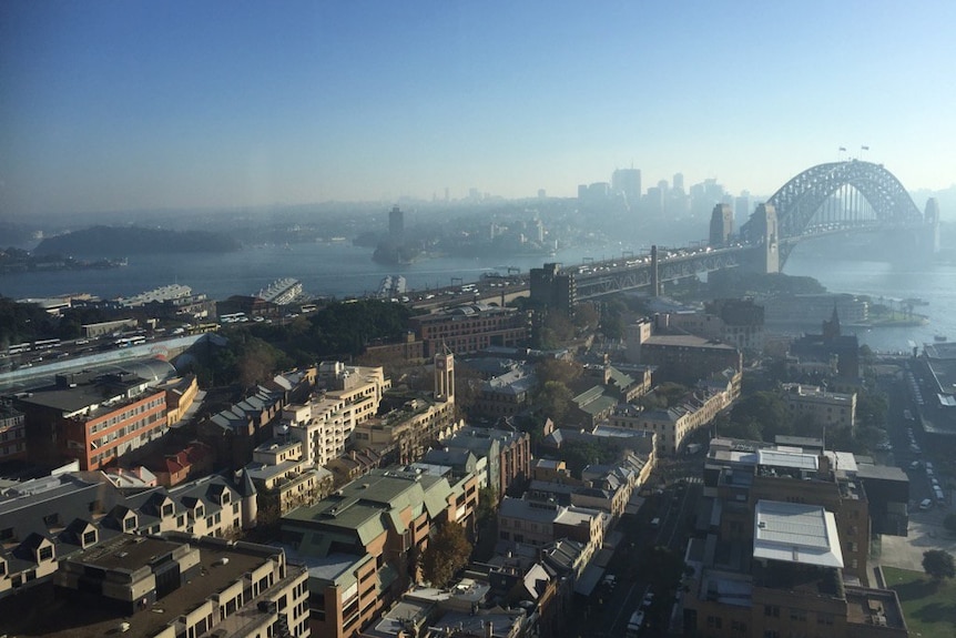 Smoke covers Sydney during hazard reduction burns this morning.