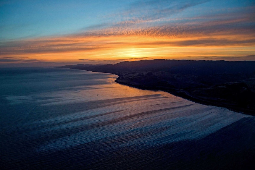 Oil slick at sunrise