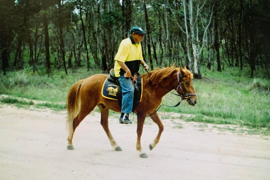 Local horse enthusiast Ronald Morris riding a broken-in brumby. 