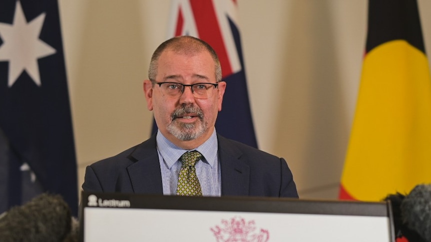 Acting Chief Health Officer Peter Aitken at a COVID-19 press conference 