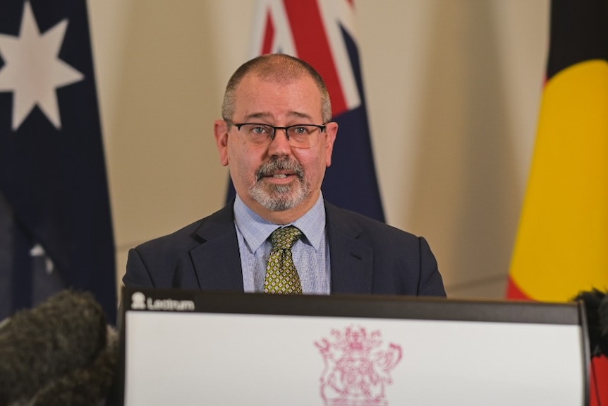 Acting Chief Health Officer Peter Aitken at a COVID-19 press conference 