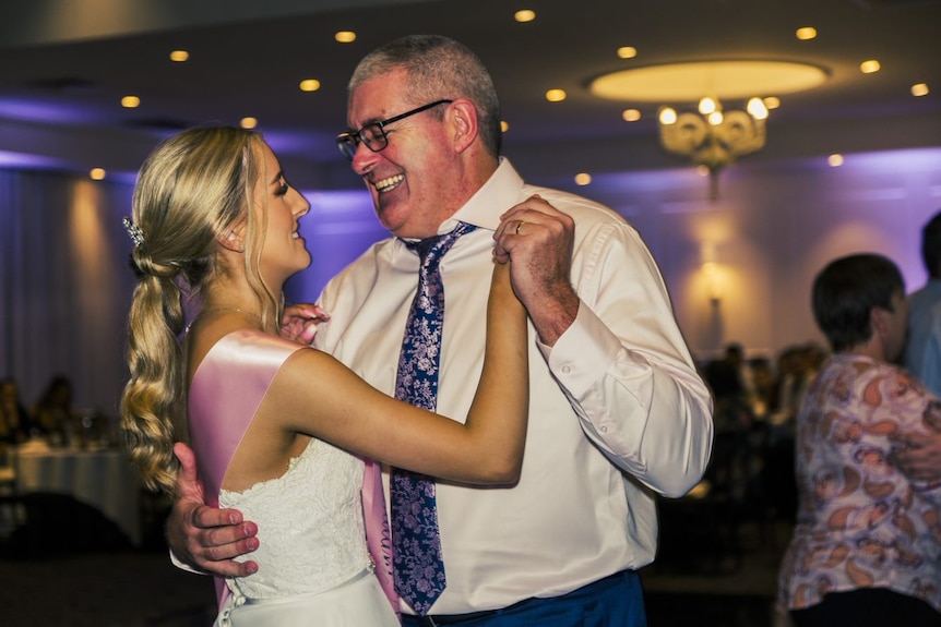 Gemma and her dad dance together at Gemma's ball