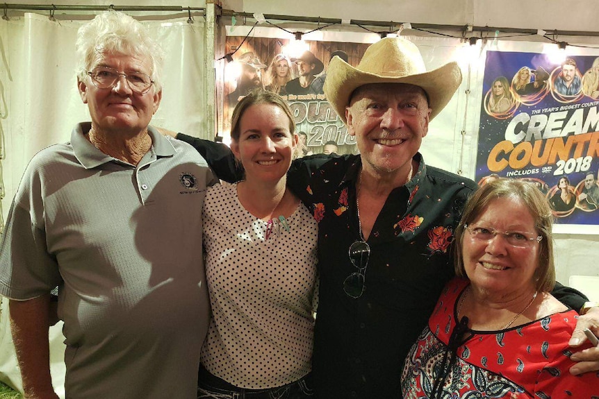 'Butch' Lenton's brother Bunt Lenton, his daughter Carly Cox and his wife Ros Lenton pose with Russell Morris