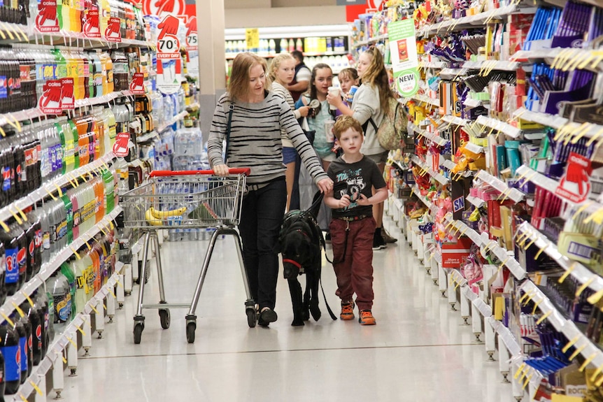 Teresa, Reilly and Jason doing the shopping.