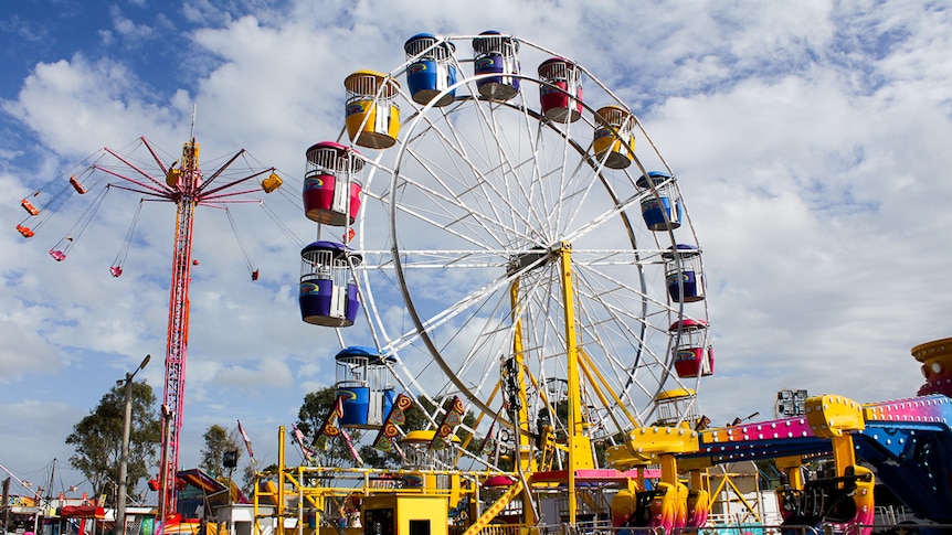 A small ferris wheel at a country show