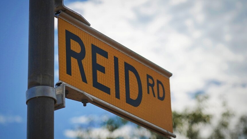 A street sign reading Reid Road
