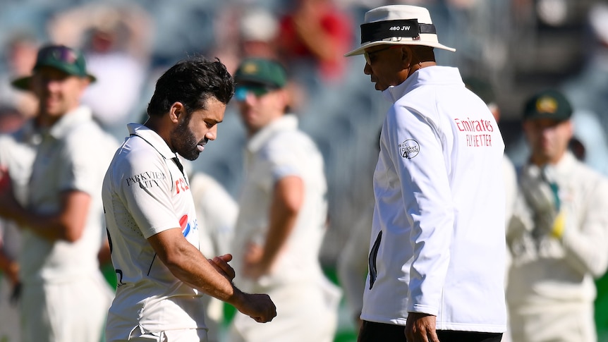 Mohammad Rizwan of Pakistan speaks to umpire Joel Wilson during a DRS review at the Boxing Day Test.