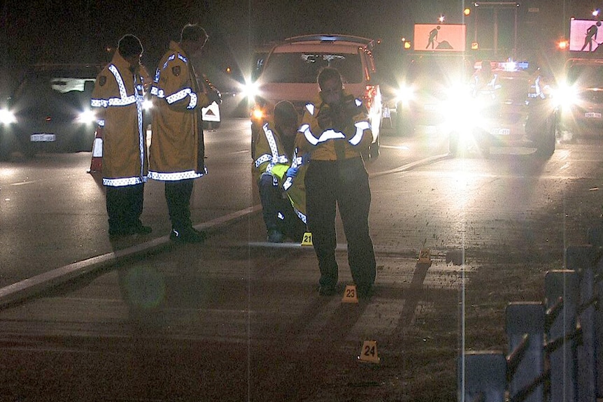 Forensic police on the Mitchell Freeway examine site of serious assault 7 June 2015