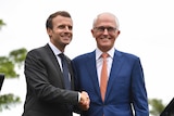 Malcolm Turnbull and Emmanuel Macron shake hands at a joint press conference in Sydney.