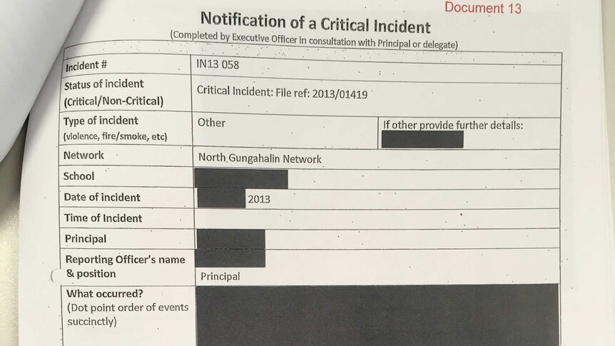 A notification of critical incident document that is heavily blacked out