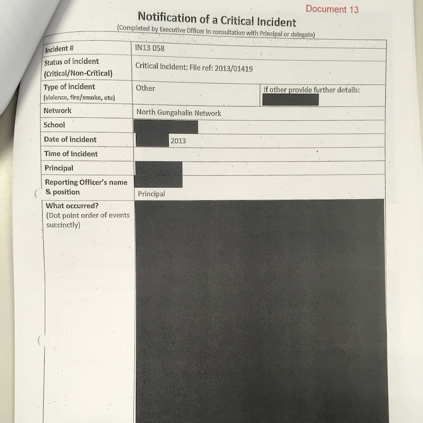 A notification of critical incident document that is heavily blacked out