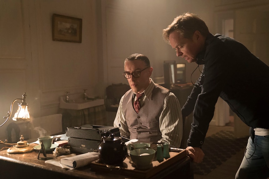 Colour photo of Jon S. Baird directing Steve Coogan on the set of 2018 film Stan and Ollie.