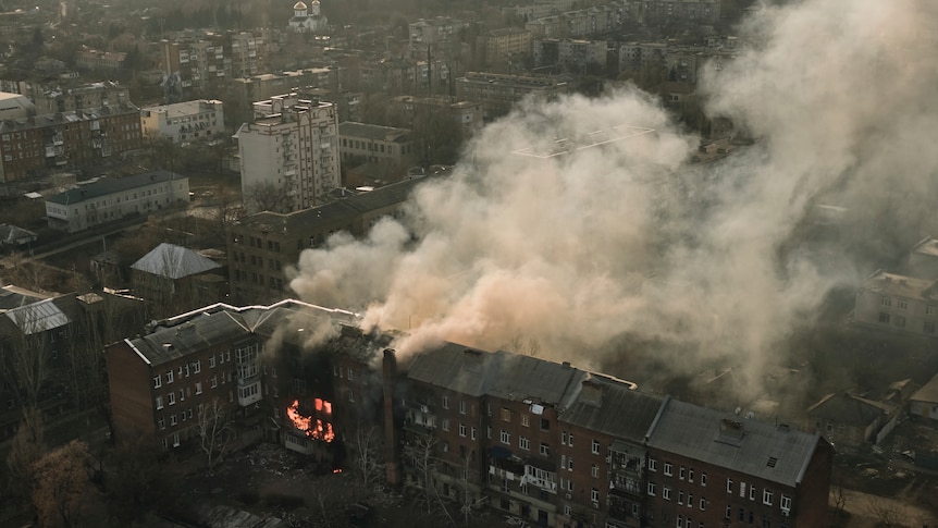 An apartment burns after Russian shelling in Bakhmut.