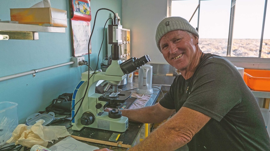 Murray Davidson looking happy at his larvae stock