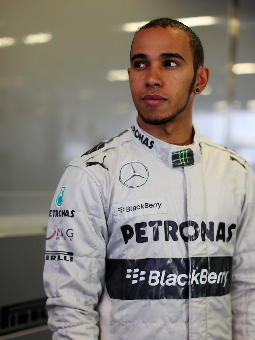 Mercedes GP's Lewis Hamilton poses for a portrait at Formula One winter testing in February 2013.
