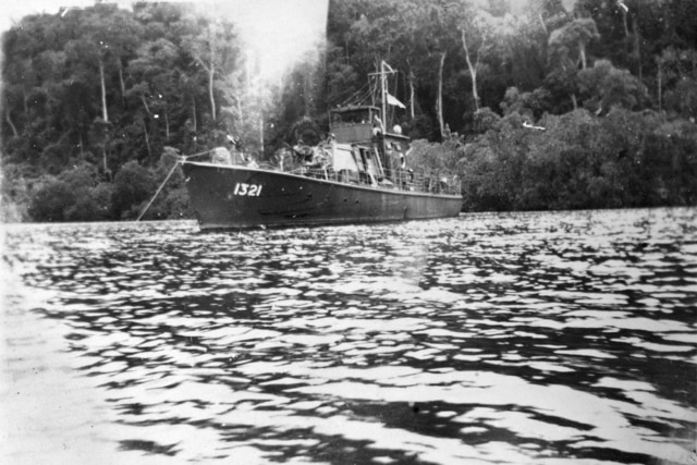 A monochrome of a Naval motor launch at anchor with the number 1321 on the bow.