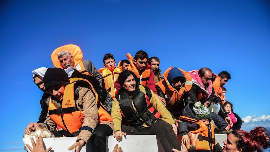 Asylum seekers in life jackets
