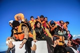 Asylum seekers in life jackets
