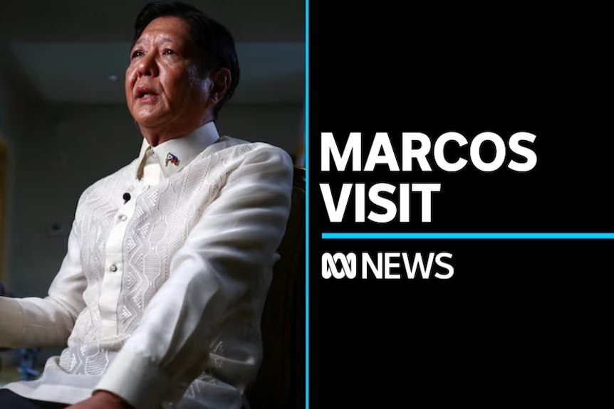 Marcos Visit: Man in white shirt sitting in chair speaking