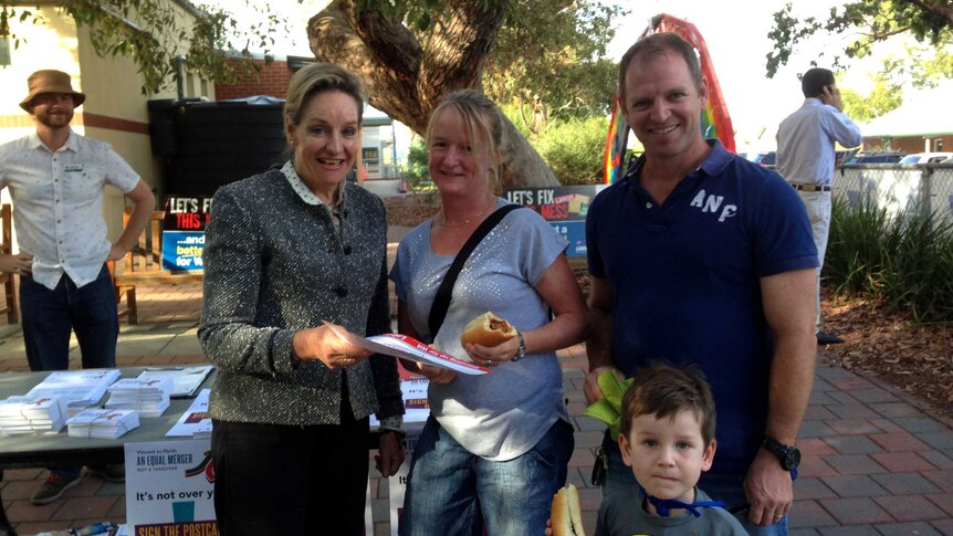 Labor's Alannah MacTiernan speaks with voters in the WA Senate election. April 5, 2014.
