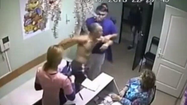 Russian doctor Ilya Zelendinov is shown in a CCTV still punching patient Yevgeny Bakhtin.