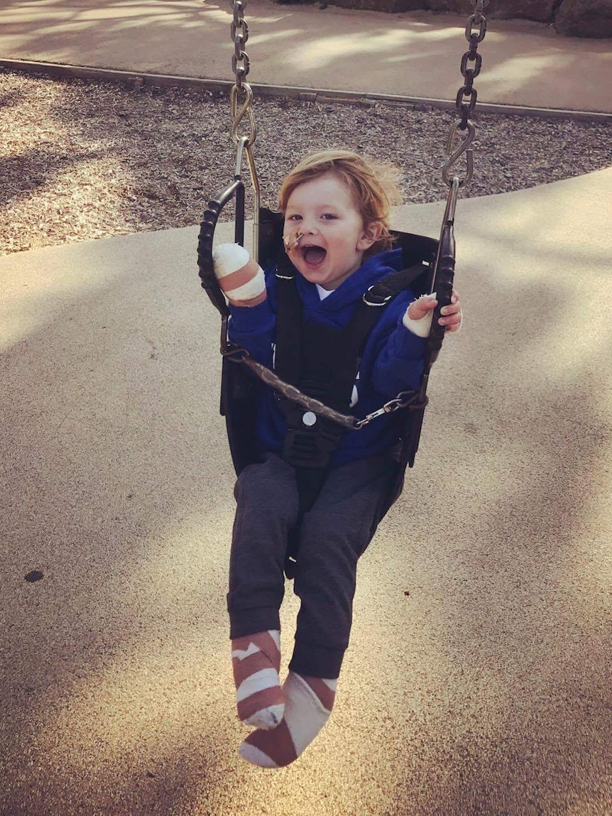 Meningococcal victim Arthur Long on swing