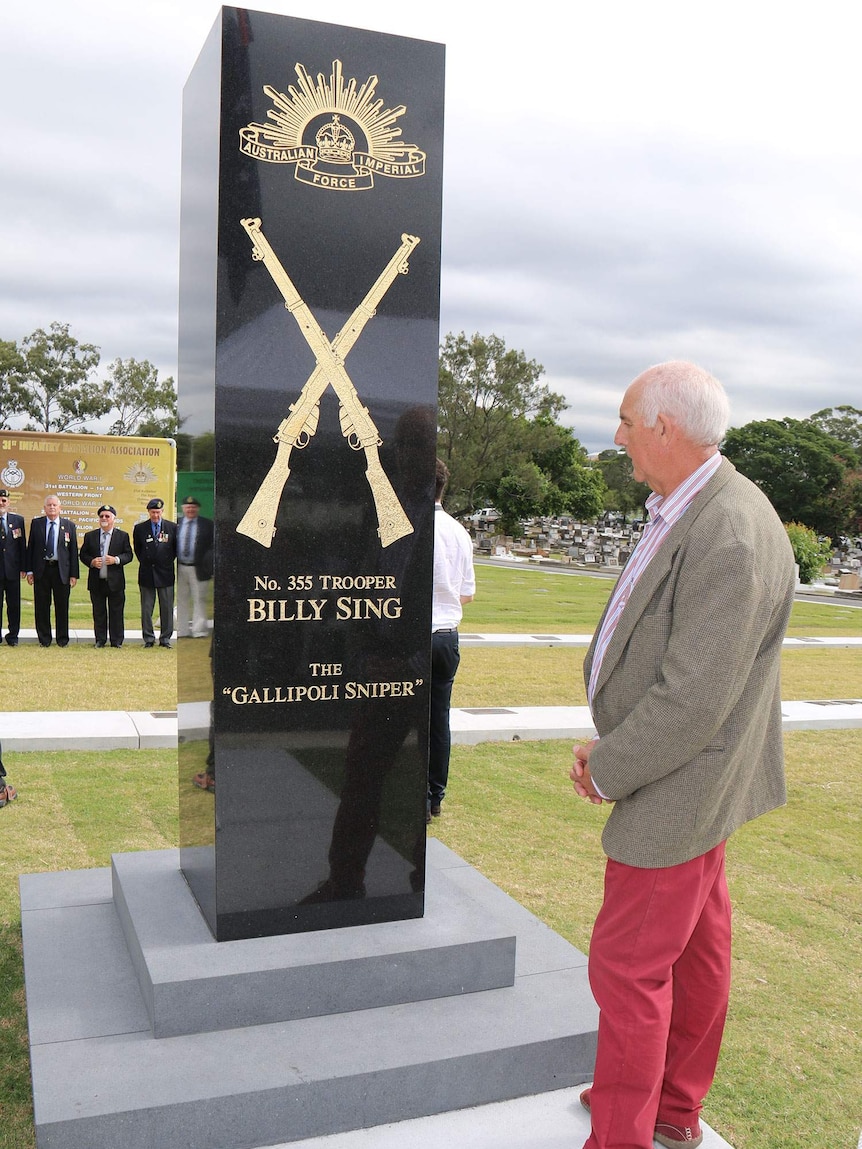 Billy Sing's last known surviving relative Don Smith at the memorial in Lutwyche Cemetery.