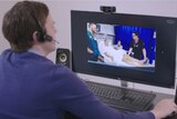 Specialist treats a stroke patient via Skype as part of the telestroke program