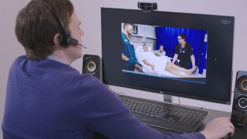 Specialist treats a stroke patient via Skype as part of the telestroke program