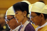 Aung San Suu Kyi reads the oath during her swearing in.