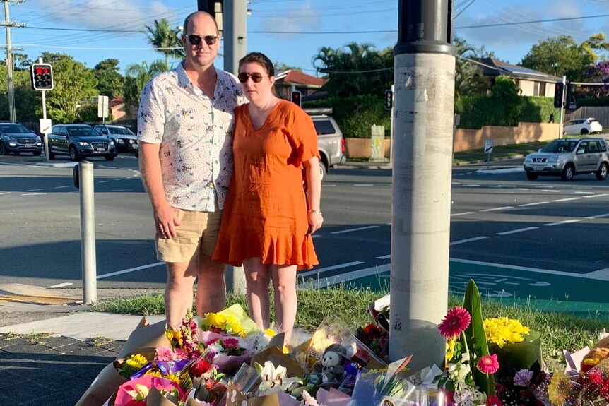 Kate Leadbetter's uncle and aunt Jason and Danielle Leadbetter at the tributes at the scene of the crash.