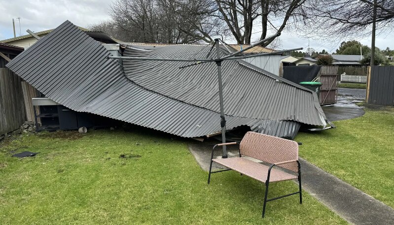 The wind tore the roof off a home in Newborough, leaving it in the property's backyard