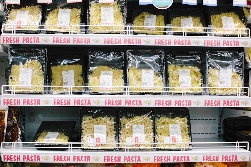 A fridge full of fresh pasta.