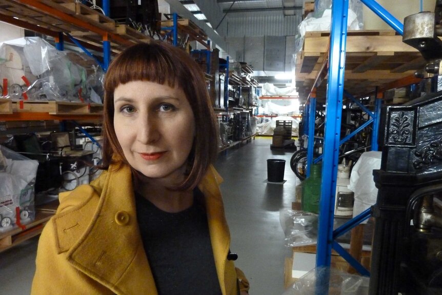 Amber Beavis in the WA Museum warehouse