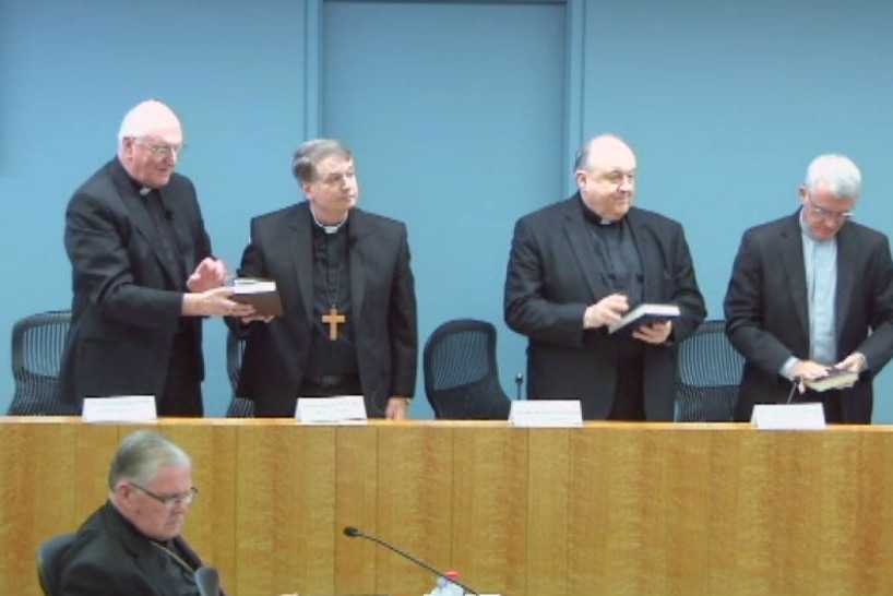 Archbishops swearing on the bible