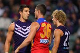 This is my house ... Fremantle skipper Matthew Pavlich gets up close and personal with Brisbane's Matt Maguire.