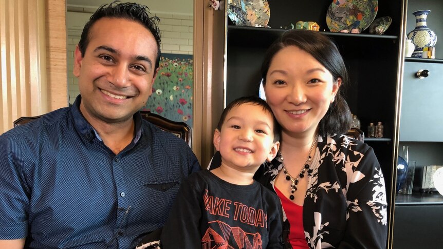 Shannon Mathias, Debbie Chen and their three-year-old son.